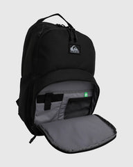 Black backpack with open front compartment on a light gray background