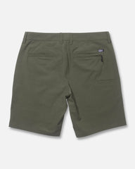 Green shorts on a light gray background