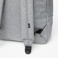 Gray backpack with a visible brand logo on a white background