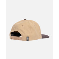 Beige cap with a black brim on a white background