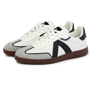 White sneakers with black and gray accents on a white background