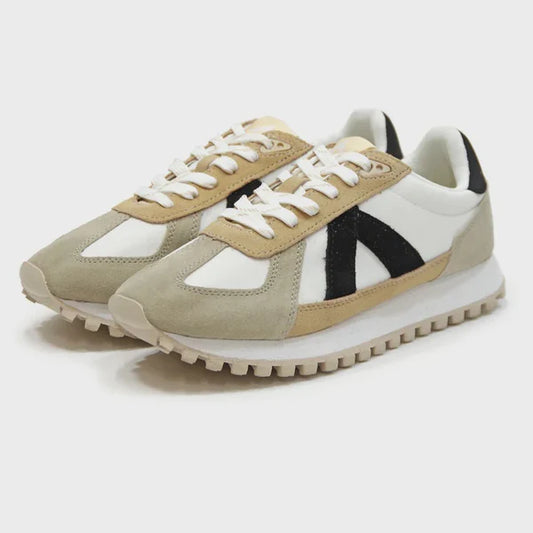 Pair of beige, white, and black sneakers on a light gray background