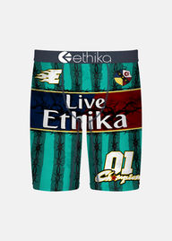 A pair of boxer briefs featuring a green and black striped pattern with barbed wire motifs, a dark navy blue band with the white 'ethika' logo, a red band with 'Live Ethika' in white text, and a gold '01 Champion' print on the lower right leg.