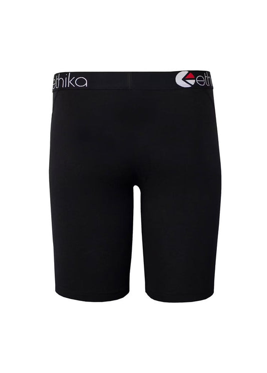 Black athletic shorts with a wide waistband featuring the brand name 'ethika' in white on the left and a red and white logo on the right, shown against a plain white background.