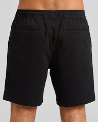 Black shorts on a gray background