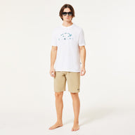 Person wearing a white t-shirt and beige shorts on a white background