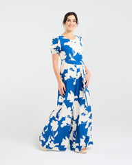 Lady wearing Blackstone Juliana Tie Waist Jumpsuit with white background