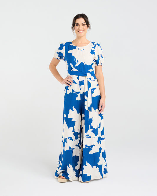 Lady wearing Blackstone Juliana Tie Waist Jumpsuit with white background