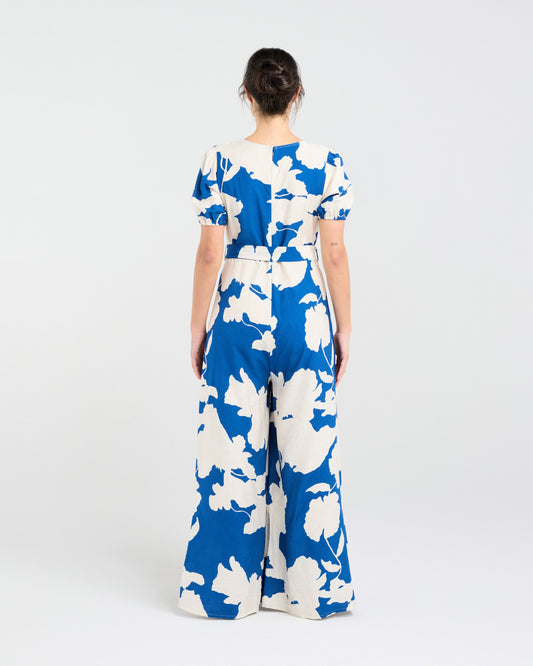 Lady wearing Blackstone Juliana Tie Waist Jumpsuit with white background