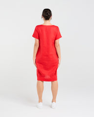 Person wearing Blackstone Lilian Linen Bubble Hem Dress on a white background