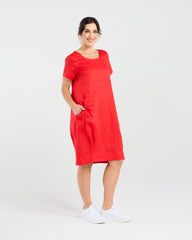 Person wearing Blackstone Lilian Linen Bubble Hem Dress on a white background