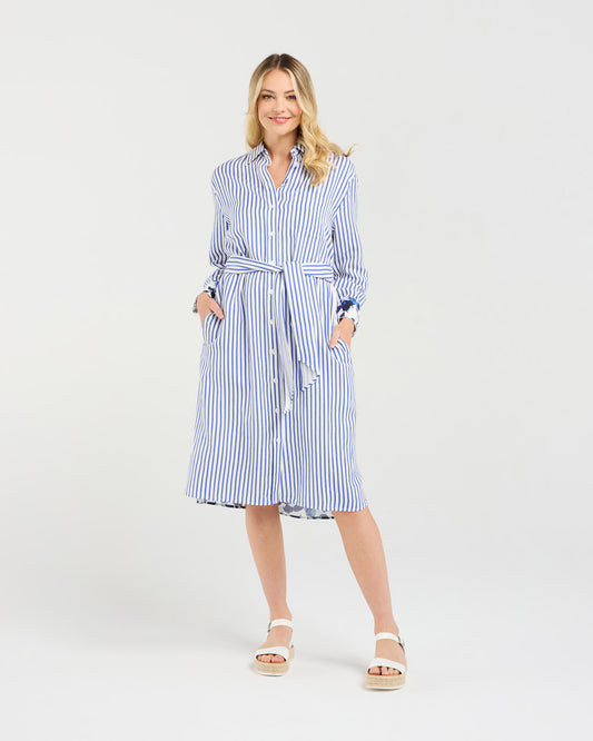Woman wearing a blue and white striped dress on a white background