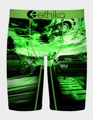 Green and black boxer briefs with car design and 'ethika' branding.
