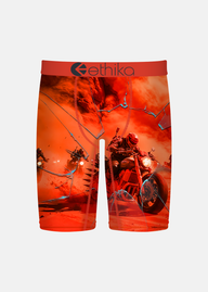 Orange boxer briefs with motorcycle graphic and 'ethika' branding on a white background