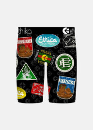 Black shorts with multiple Ethika logos on a white background