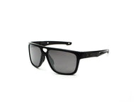 Black sunglasses with dark lenses on a white background