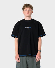 Person wearing a black t-shirt with a logo on a white background