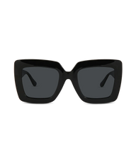 Black oversized square sunglasses with dark gray lenses, shown from the front on a plain white background.