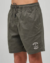 Charcoal shorts with a logo on a gray background