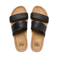 Pair of cork sandals with black straps on a white background