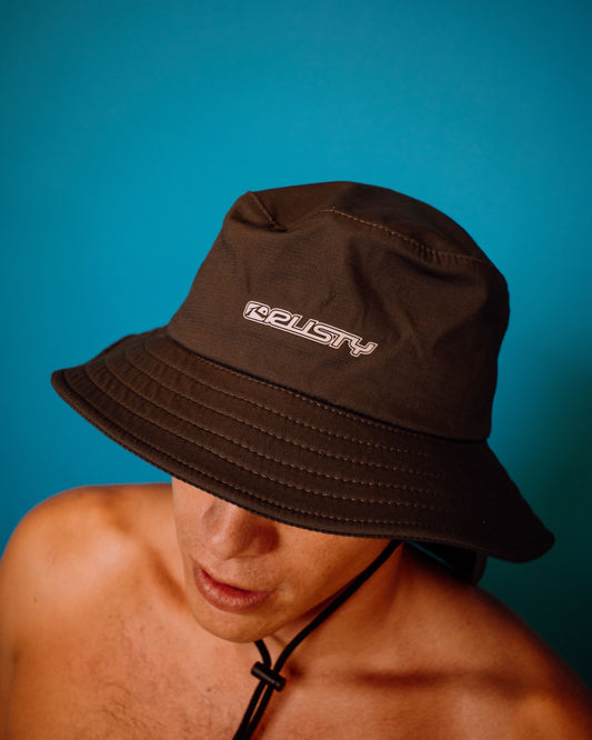 Brown bucket hat with 'Foolery' logo on a blue background