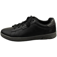 Black sneaker with 'Skechers' branding on a white background