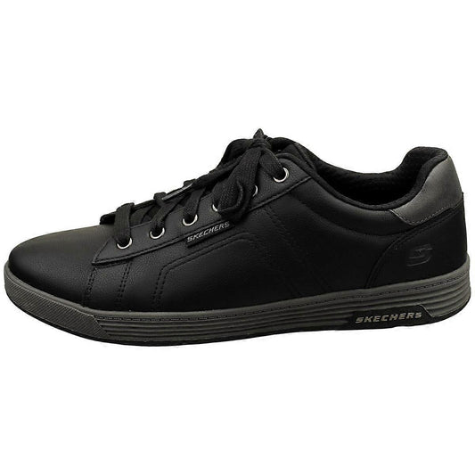 Black sneaker with 'Skechers' branding on a white background