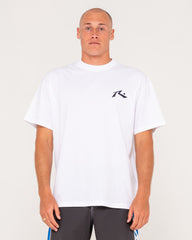 Man wearing a white t-shirt with a logo on a plain background