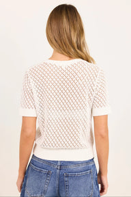 short-sleeve cream-colored knit sweater