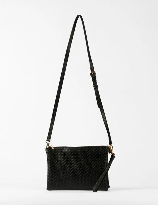 Black woven handbag with a strap on a light gray background