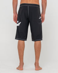 Black shorts with a logo on a white background