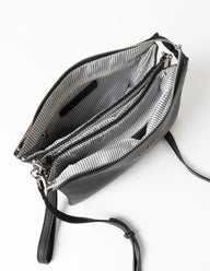 Black leather clutch bag with a strap on a white background