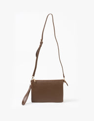 Brown leather crossbody bag on a white background