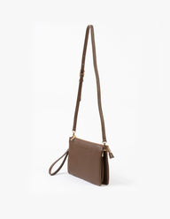 Brown leather crossbody bag on a white background