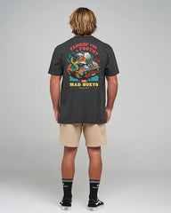 Person wearing a black t-shirt with colorful graphic design on the back, standing against a gray background.