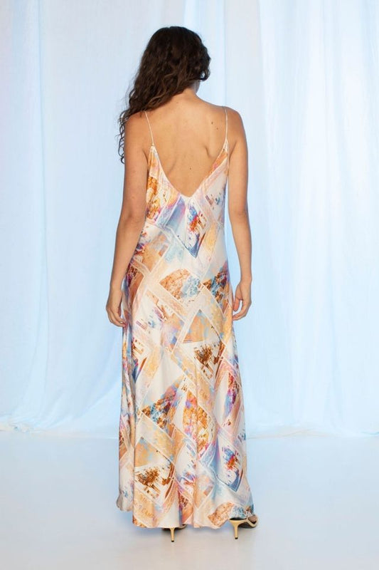 Woman wearing a floral dress with a white background