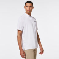 Man wearing a white polo shirt with a logo on a white background