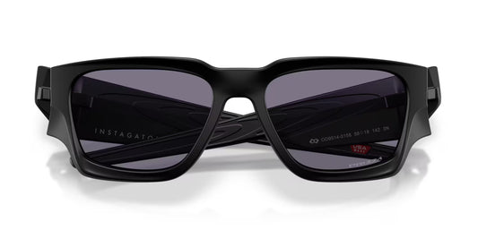Black sunglasses with dark lenses on a white background