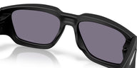 Black sunglasses with dark lenses on a white background