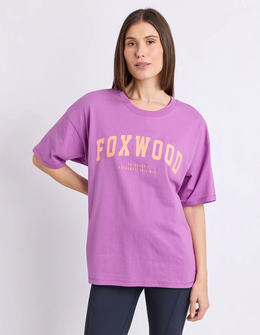 purple tee with orange writing and foxwood logo front and back