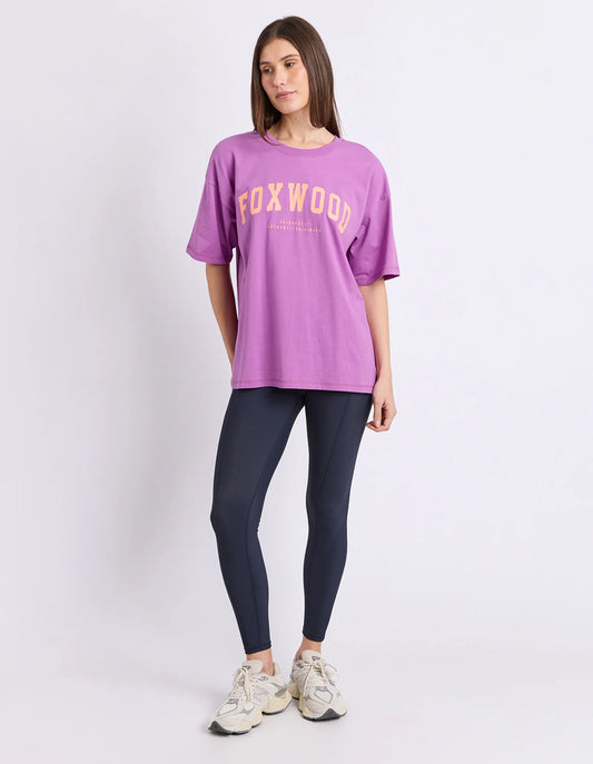 purple tee with orange writing and foxwood logo front and back