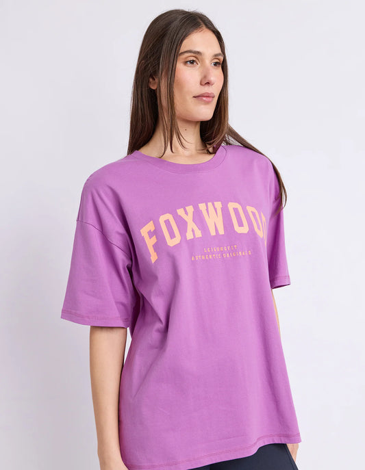 purple tee with orange writing and foxwood logo front and back