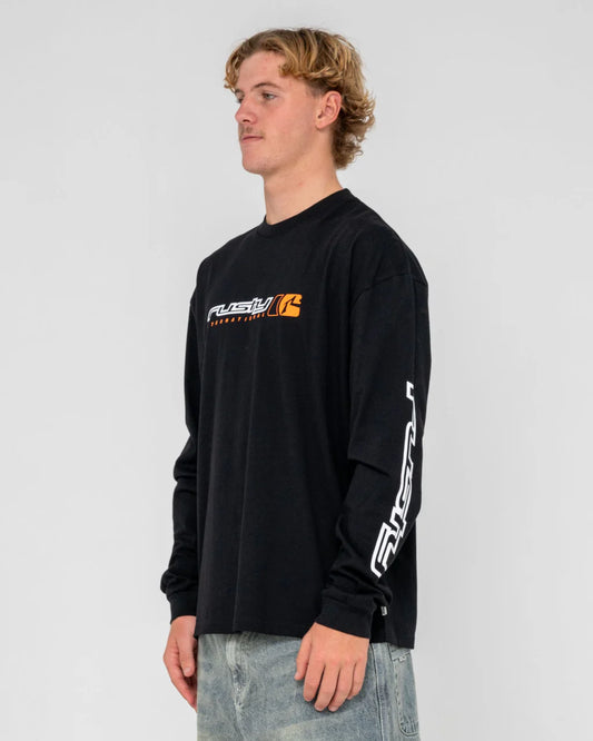 Person wearing a black long-sleeve shirt with a logo on a plain background