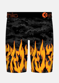 Black digital camouflage shorts with orange flames on a white background