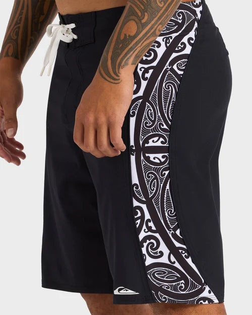 Black shorts with white tribal pattern on a white background
