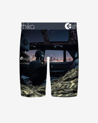 Boxer briefs with a car interior and money design, featuring the brand 'ethika'.