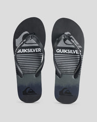 Black and gray sandal with Quiksilver logo on a light gray background