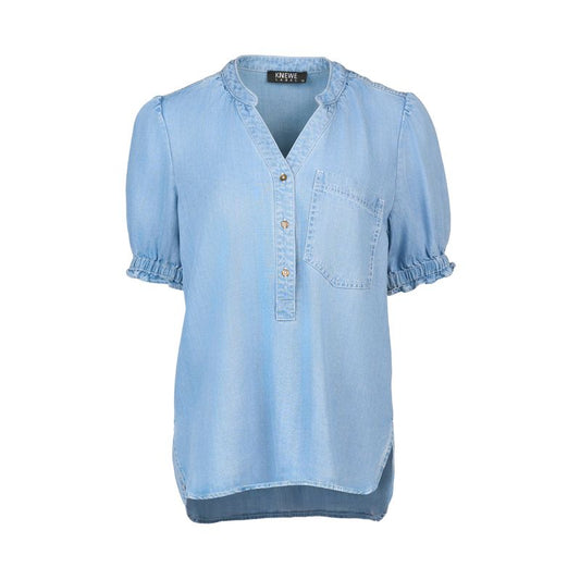 Light blue denim shirt with short sleeves on a white background