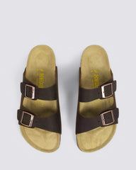 A pair of dark brown double-strap slide sandals with square metal buckles and a tan footbed, shown from a top-down view on a light gray background.