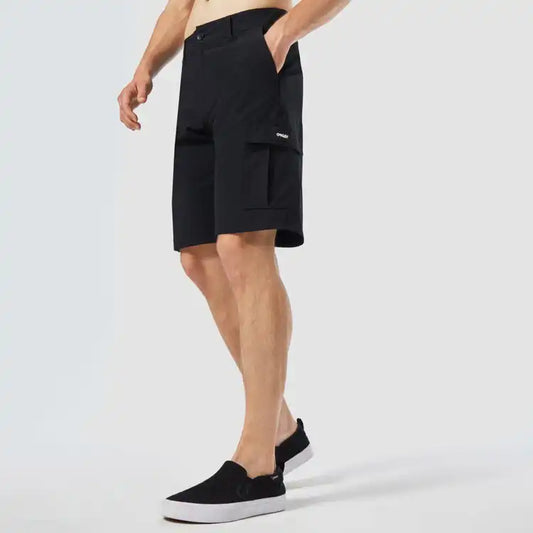 Person wearing black shorts on a white background